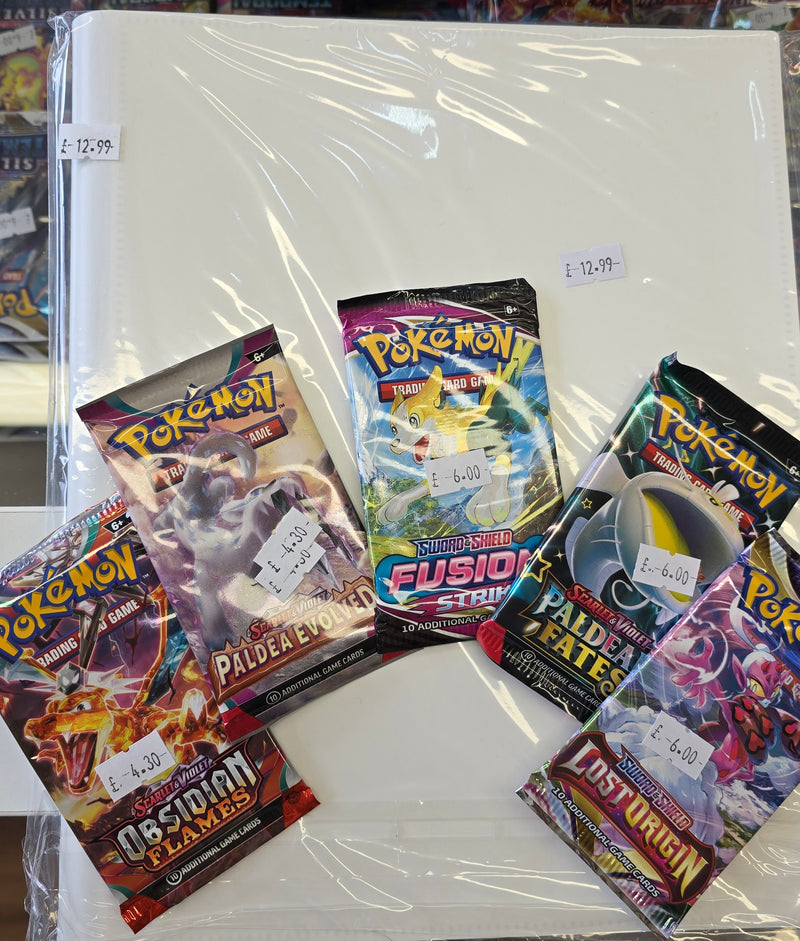 Pokemon 5 mixed booster packs and binder set